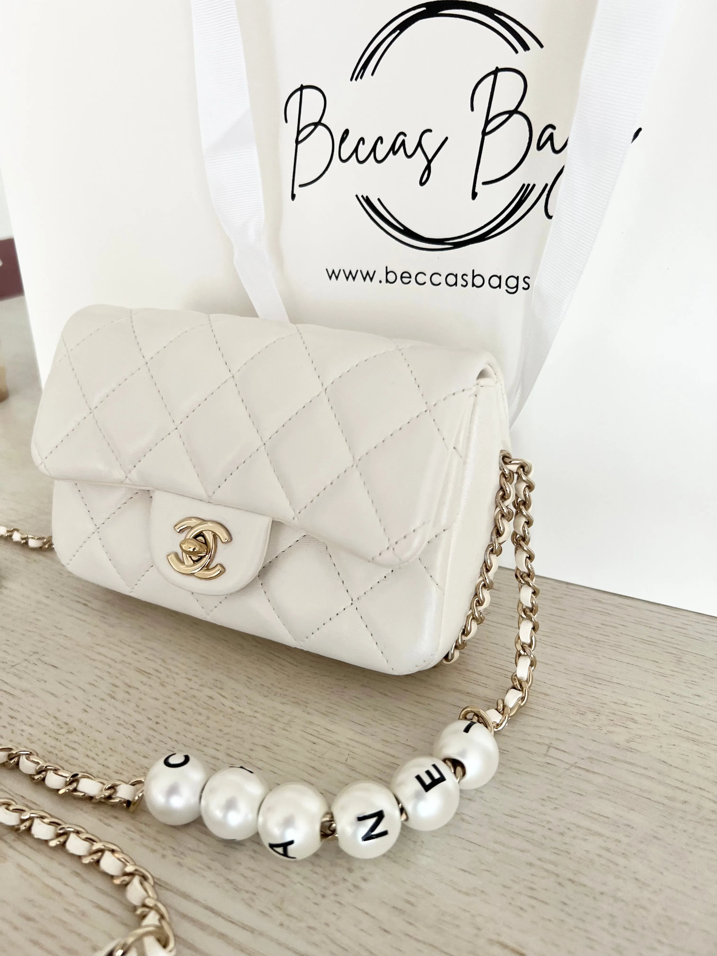 Chanel Logo Pearl Chain Bag