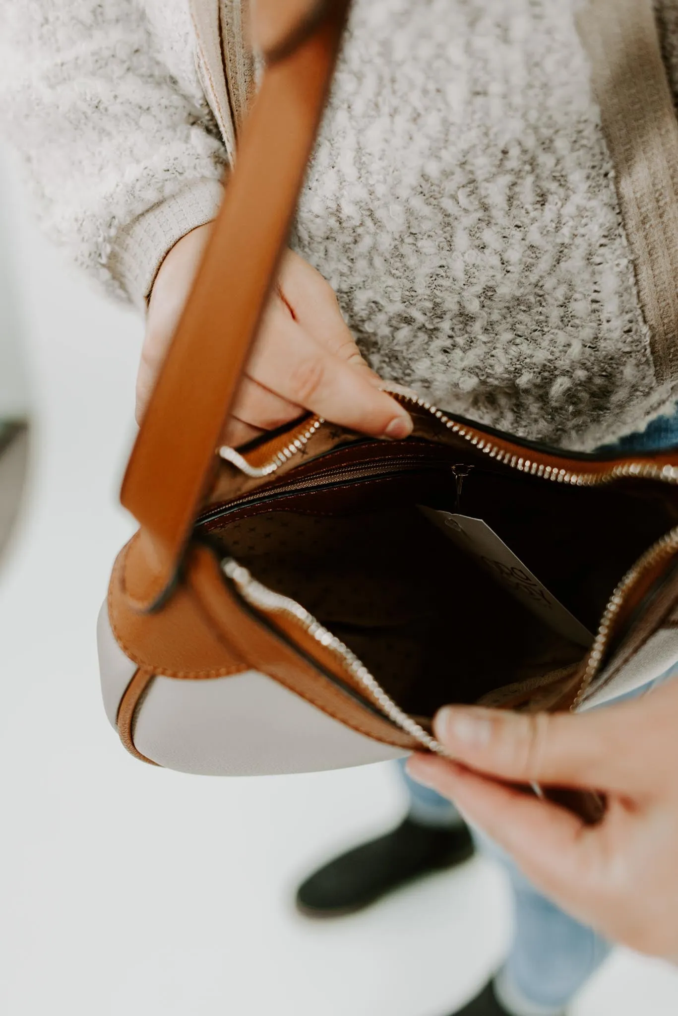 Half-Moon Vegan Leather Crossbody Bag in Taupe